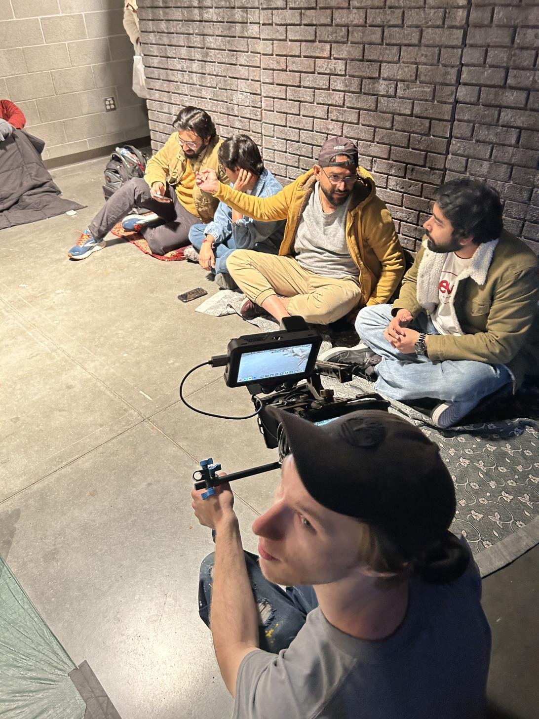 Filming against the brick wall