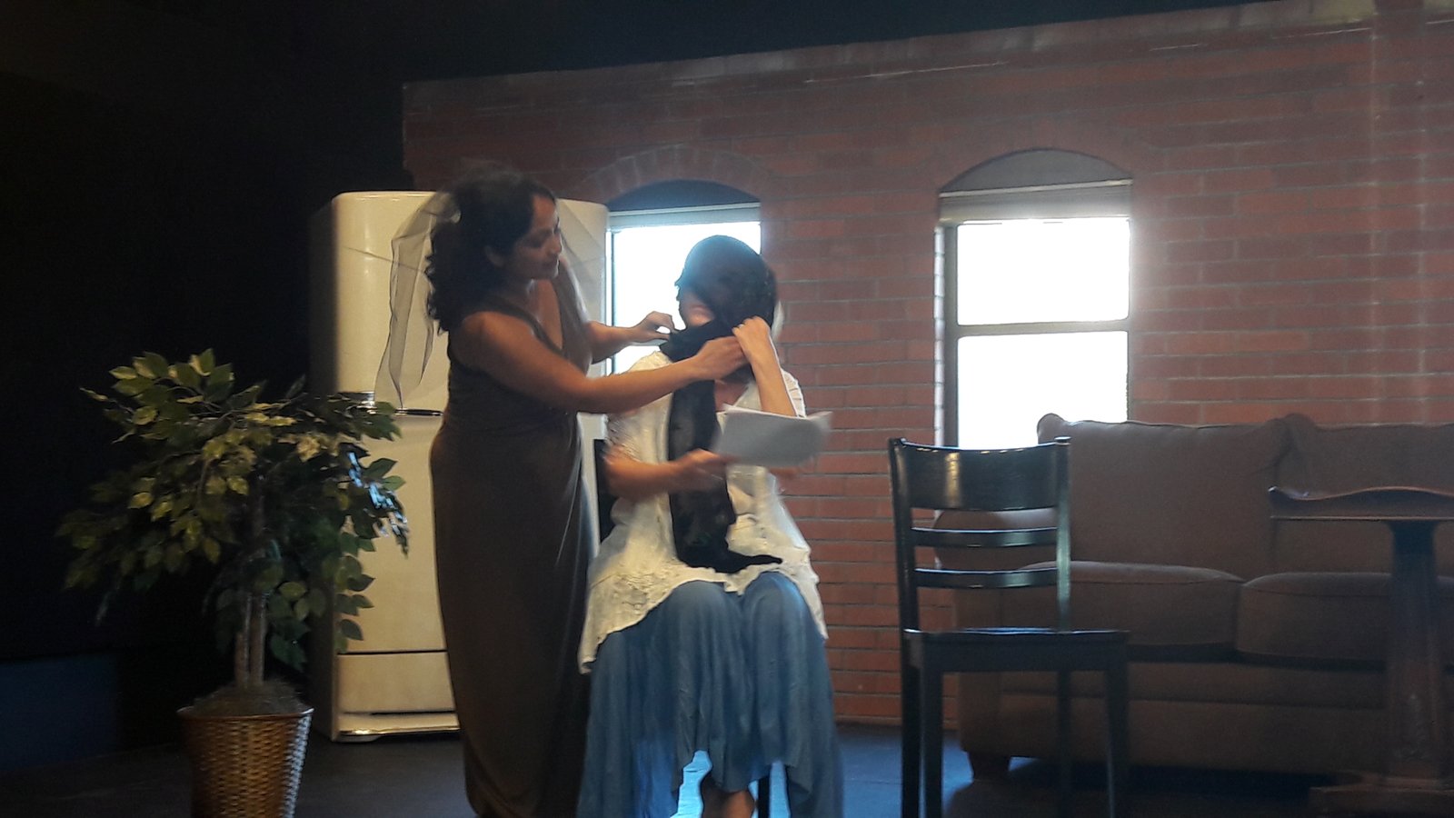 Backstage, getting into character before a scene